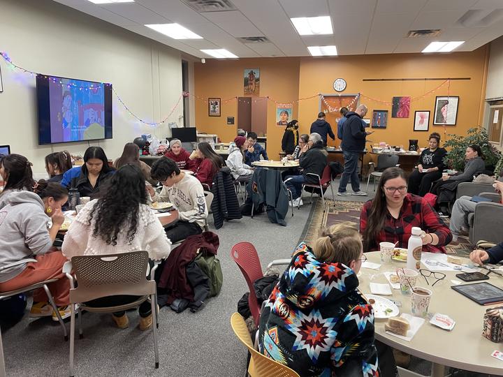 Members of the UMN community gather for a social event and dinner at COIN